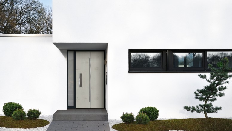 Schlicht in Grau: Haustüren mit Art-Beton liegen im Trend
